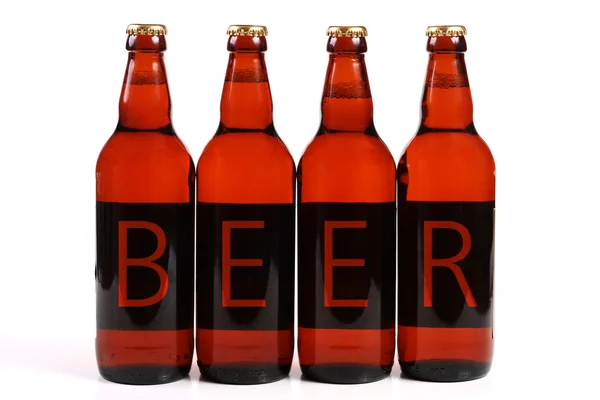 Τέσσερα μπουκάλια μπύρας — Φωτογραφία Αρχείου