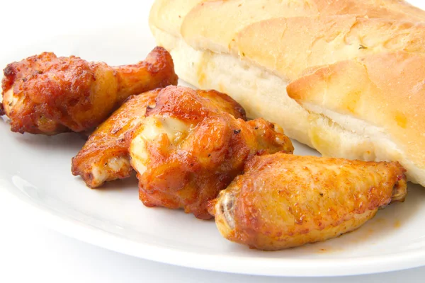 Chicken and garlic bread — Stock Photo, Image