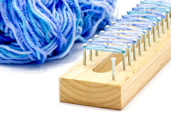Knitting block and thread — Stock Photo, Image