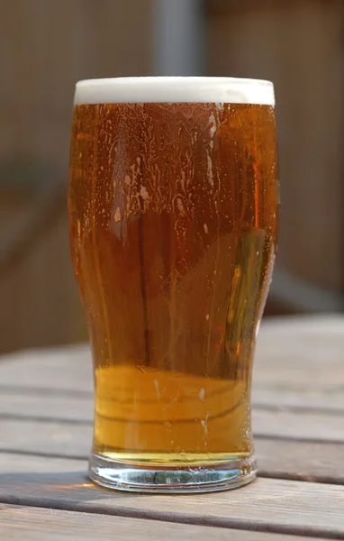 Stock image Pint of Ale on Beer Garden Table