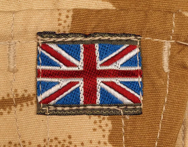 Insigna armatei britanice pe camuflajul deșertului — Fotografie, imagine de stoc