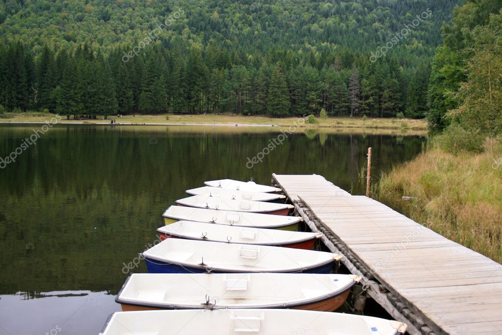 Boats on the saint ana volcanic lake, romania