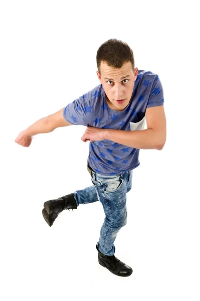 stock image Young man dancing on white background