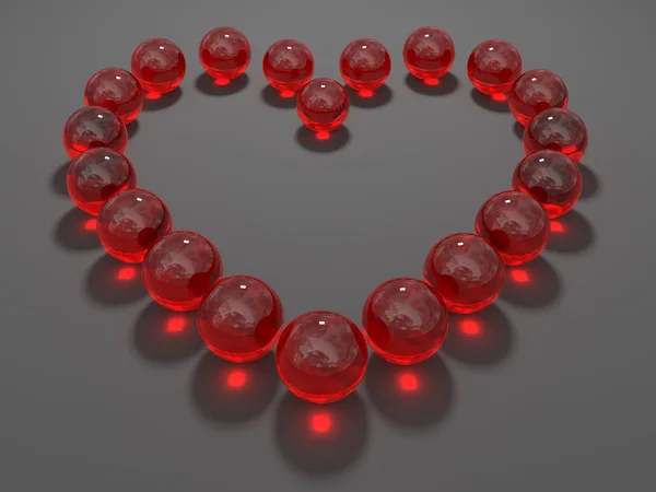 Hart samengesteld uit rood glazen bollen — Stockfoto