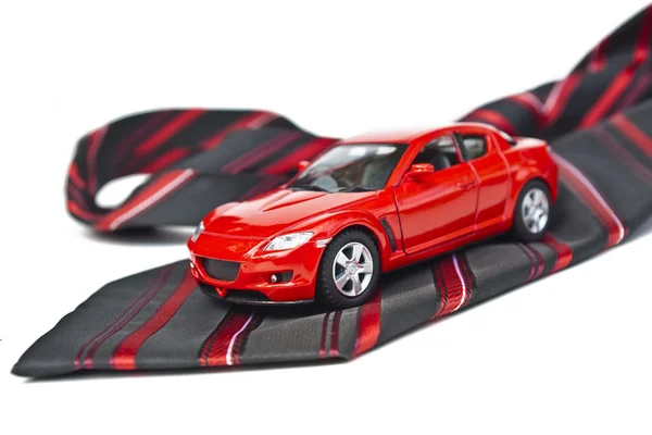 Rode auto en stropdas — Stockfoto
