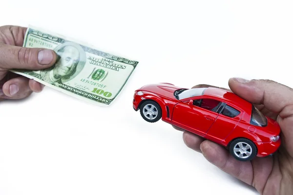Auto a peníze v rukou — Stock fotografie