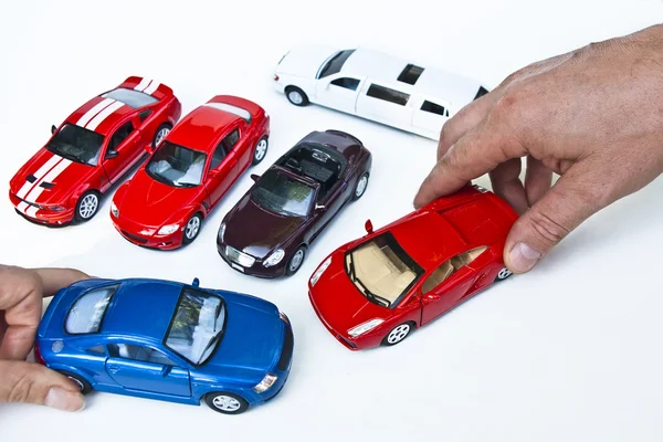 Models of car and hands — Stock Photo, Image