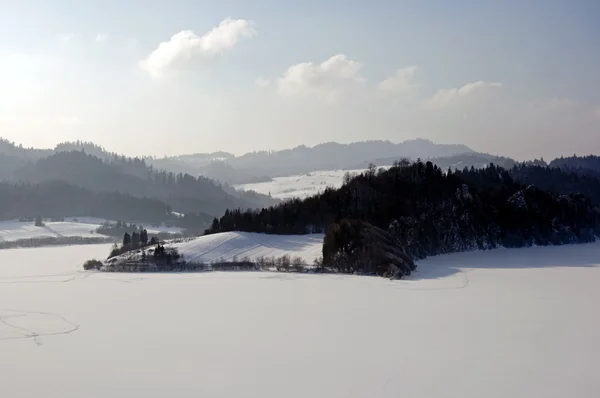 Winter view on frozen lake — Stock Photo, Image