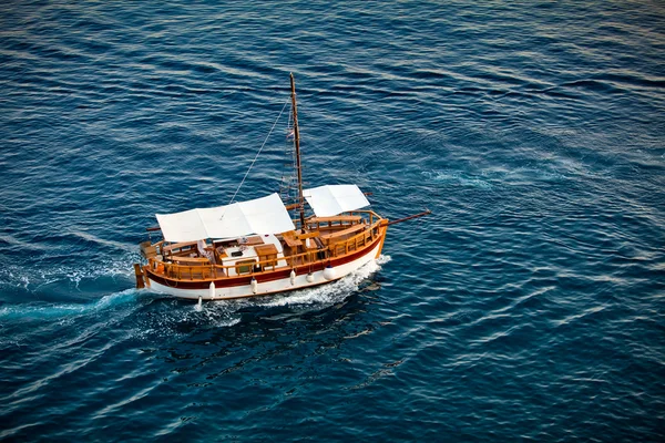 stock image The ancient old ship in the sea