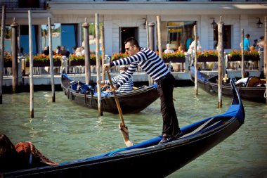 Gondolier in Venicy city, Italy clipart