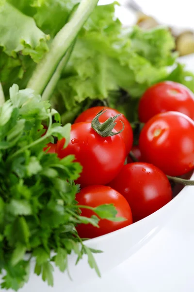 Tomatoes closeup in a salad — Stock Photo, Image