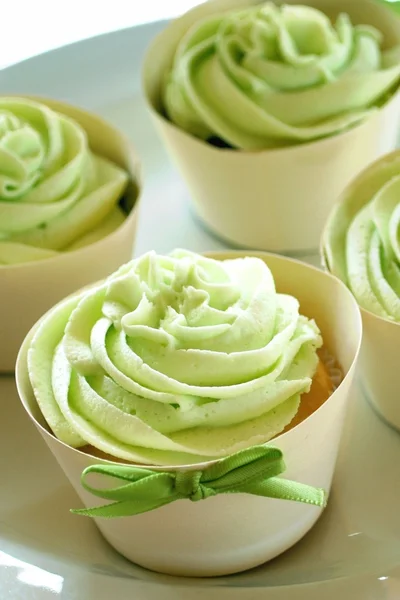Cupcakes de hielo verde Imagen de archivo