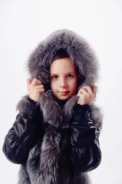 Girl in a fur jacket — Stock Photo, Image