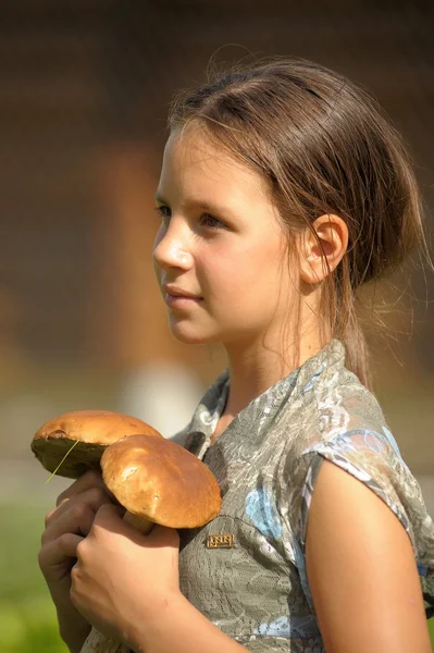 Portrait of a girl with a mushrooms — Stock Photo, Image