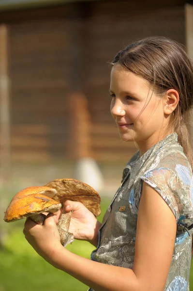 The girl with ceps The girl with ceps — Stock Photo, Image