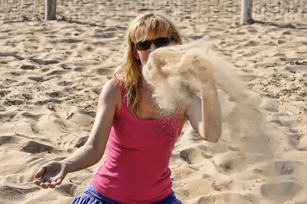 stock image Girl playing with sand