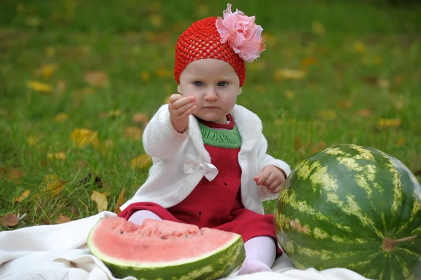The little girl with a water-melon — Stock Photo, Image