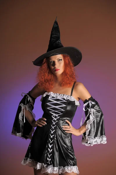 Sexy redheaded witch — Stock Photo, Image
