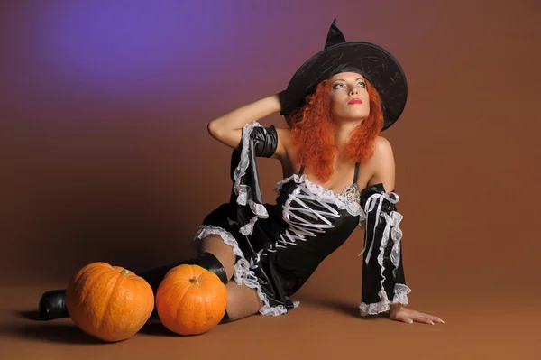 Beautiful red-haired witch — Stock Photo, Image