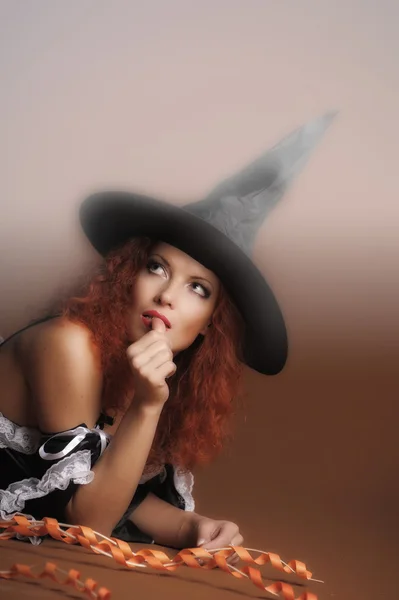 Sexy zrzavý čarodějnice — Stock fotografie
