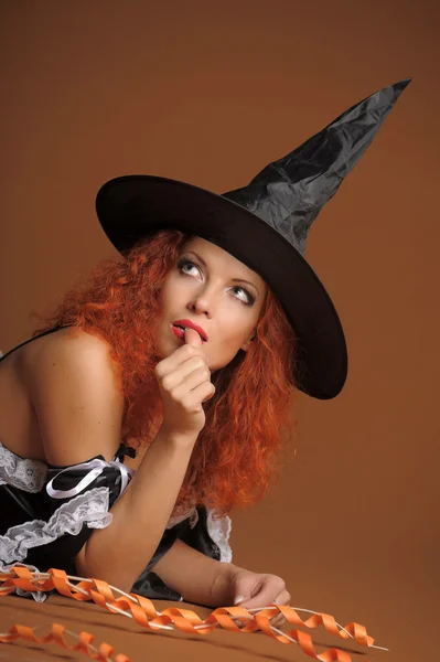 Szexi vörös hajú boszorkány — Stock Fotó