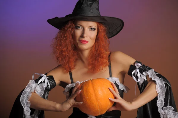 Beautiful red-haired witch Royalty Free Stock Images