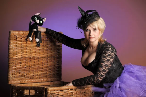 Witch met kat en pompoen — Stockfoto