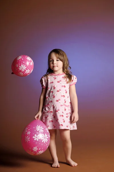 Niña con globos — Foto de Stock