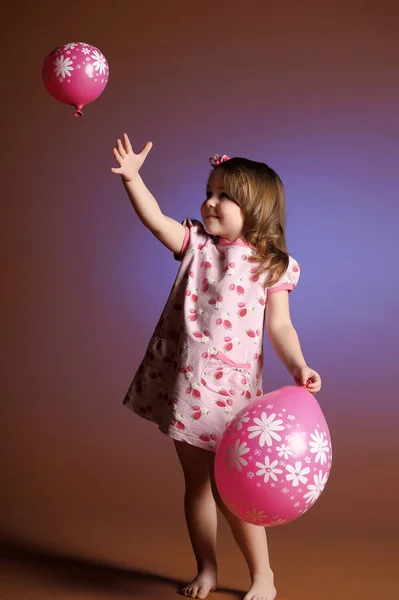 Κοριτσάκι με μπαλόνια — Φωτογραφία Αρχείου