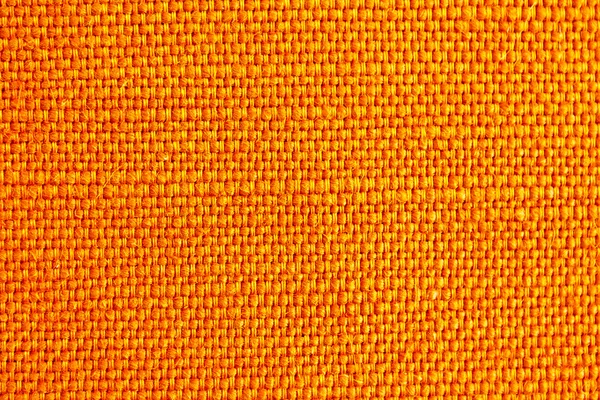 Primer plano de textura de tela naranja para el fondo — Foto de Stock