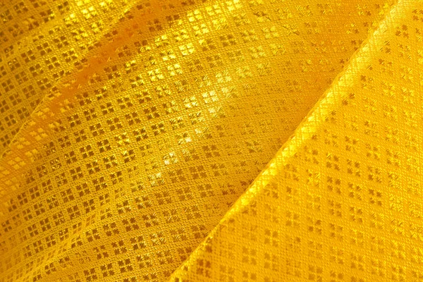 Onda de tecido amarelo — Fotografia de Stock