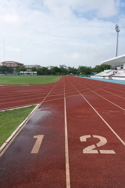 stock image Number one and two on the start of a running track