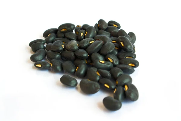 A small handful of black beans - preto. Beans isolated on a white — Stock Photo, Image