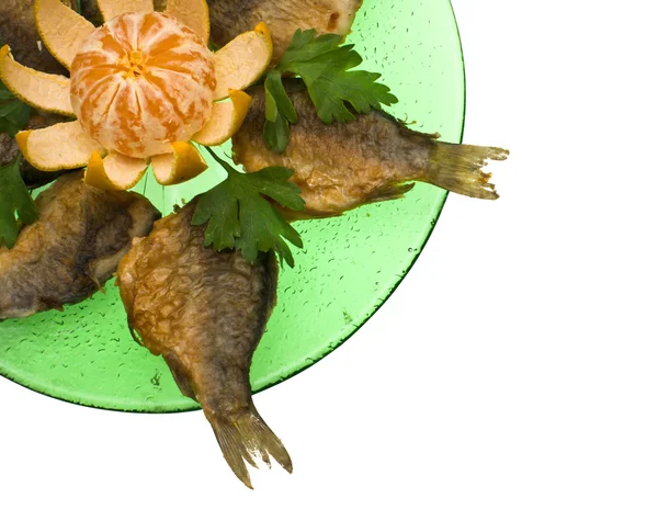 Fried carps in the Green plate with Mandarin Center. — Stock Photo, Image