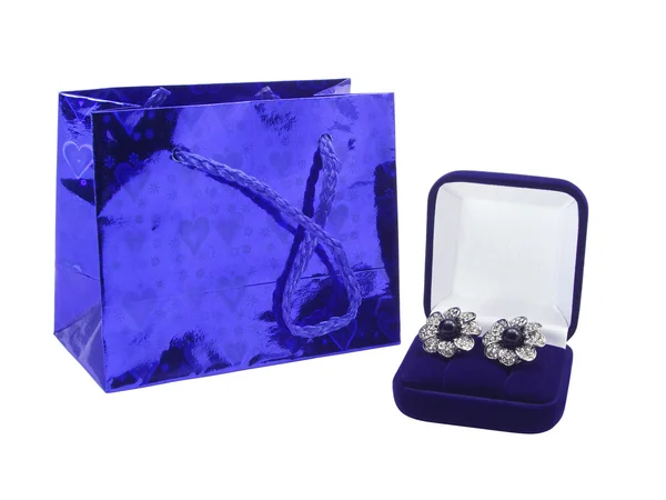 Package for gifts and an earrings — Stock Photo, Image