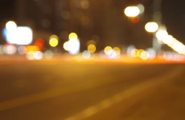 stock image Abstract night road disfocused background with light