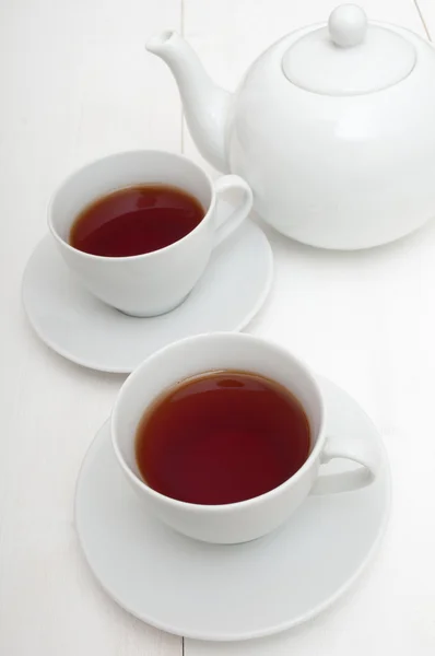 Tassen Tee und Teekanne — Stockfoto