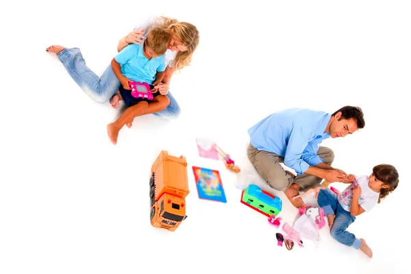 Casal brincando com crianças — Fotografia de Stock