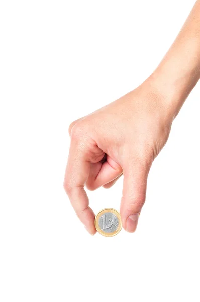 Mão segurando 1 moeda de euro — Fotografia de Stock