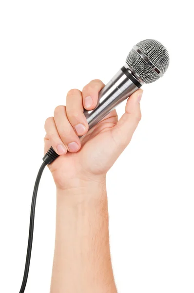 Käsi mikrofonilla — kuvapankkivalokuva