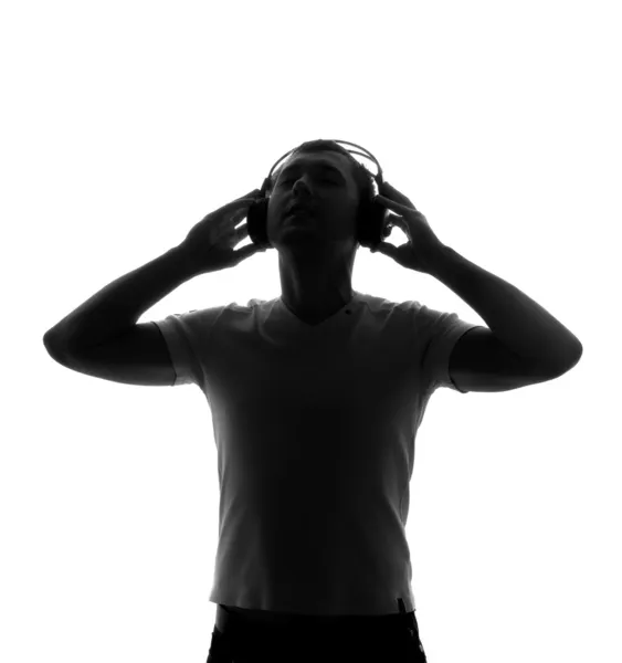 Silhouette of DJ with headphones — Stock Photo, Image