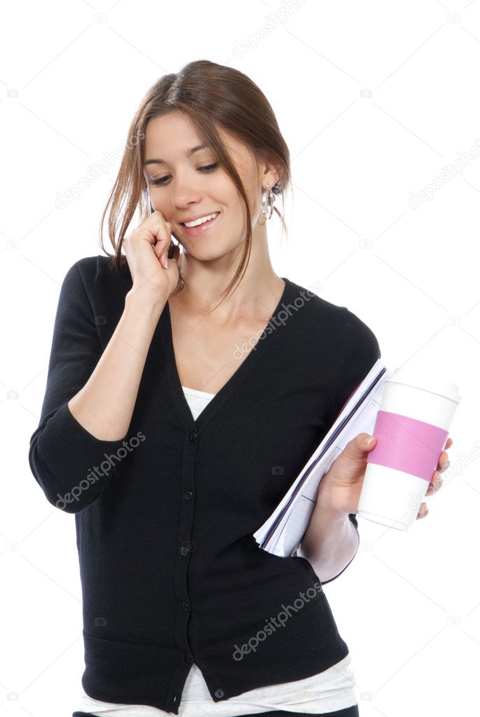 Business woman talking on the mobile phone with notebook organiz
