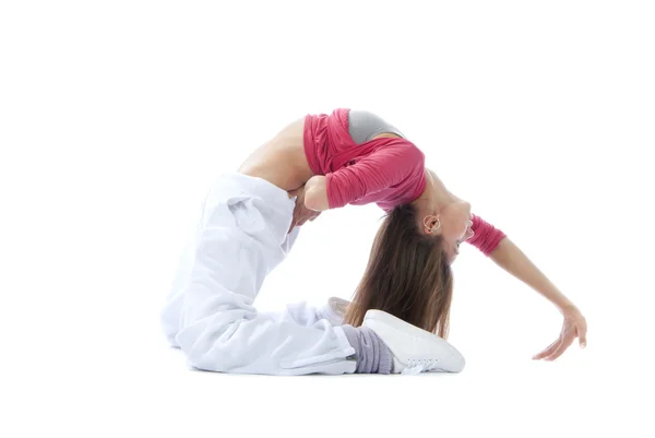 Ganska flexibel dansare kvinna stretching, värmer upp — Stockfoto