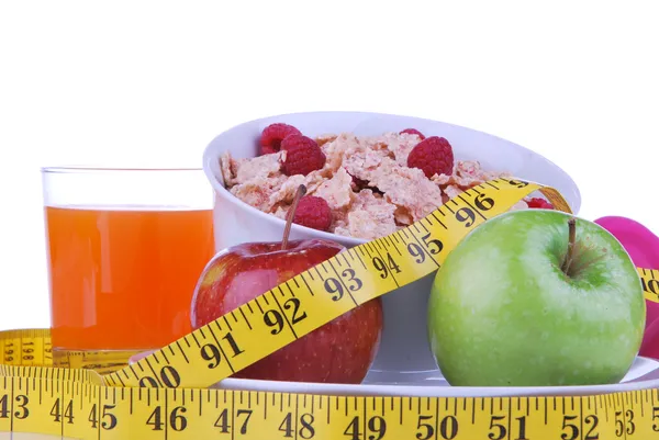 Diet weight loss food breakfast concept with tape measure — Stockfoto