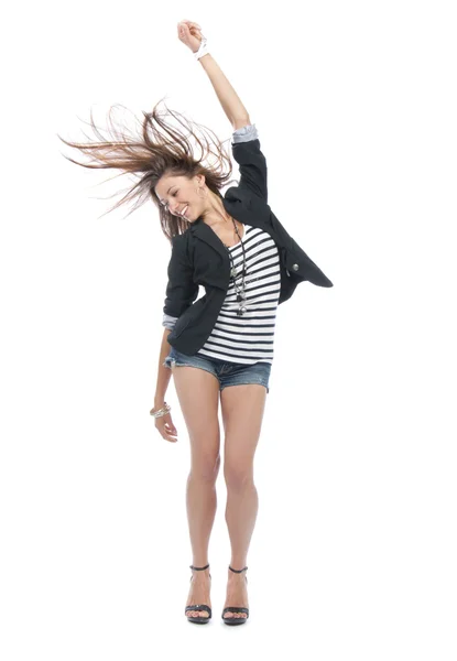 Junge schöne vollkörperbrünette Frau tanzt — Stockfoto