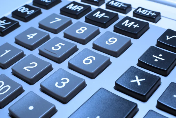 Calculator closeup with cold photo filter. — Stock Photo, Image