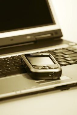 PDA ve laptop. sepya.