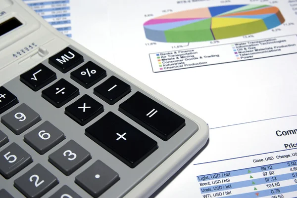 Calculator and financial analysis report. — Stock Photo, Image