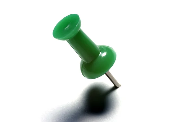 Makro zielony PIN rysunku na białym tle. — Zdjęcie stockowe