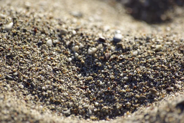 Close-up of sand at the beach of Mediterranean Sea, Turkey. Back — Stock Photo, Image